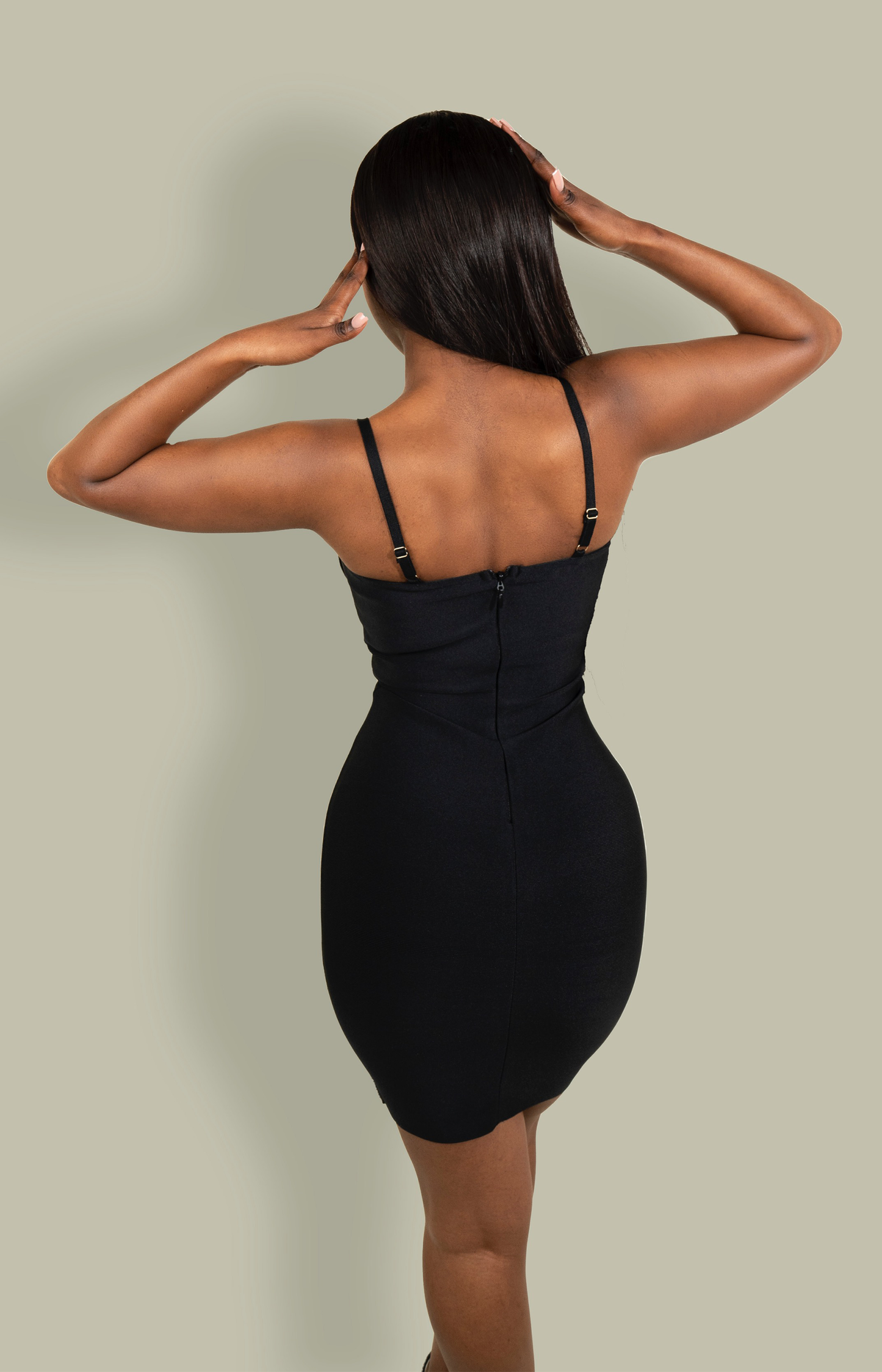 Black bandage mini dress with an embellished crystal hem