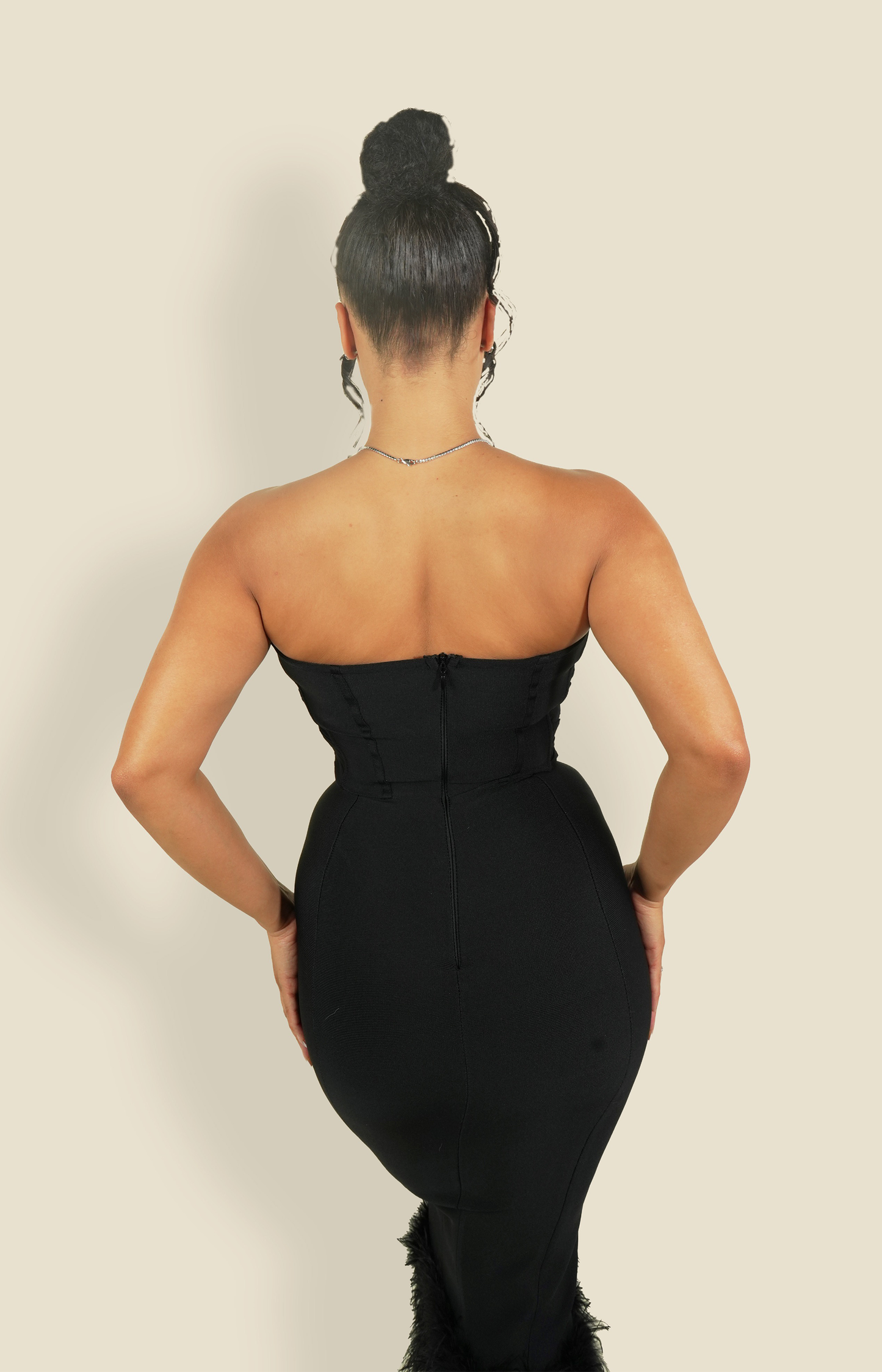 Black bandeau midi dress with feather trimmed hem