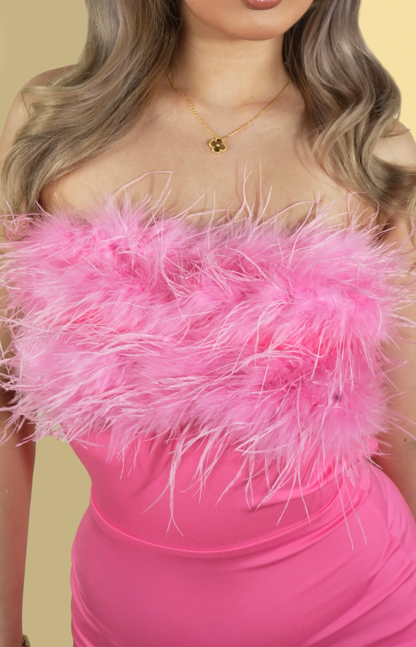 Pink strapless birthday mini dress with feather trim neckline
