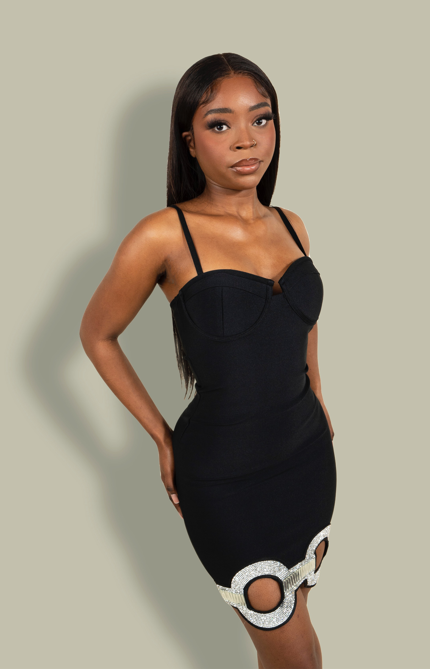 Black bandage mini dress with an embellished crystal hem