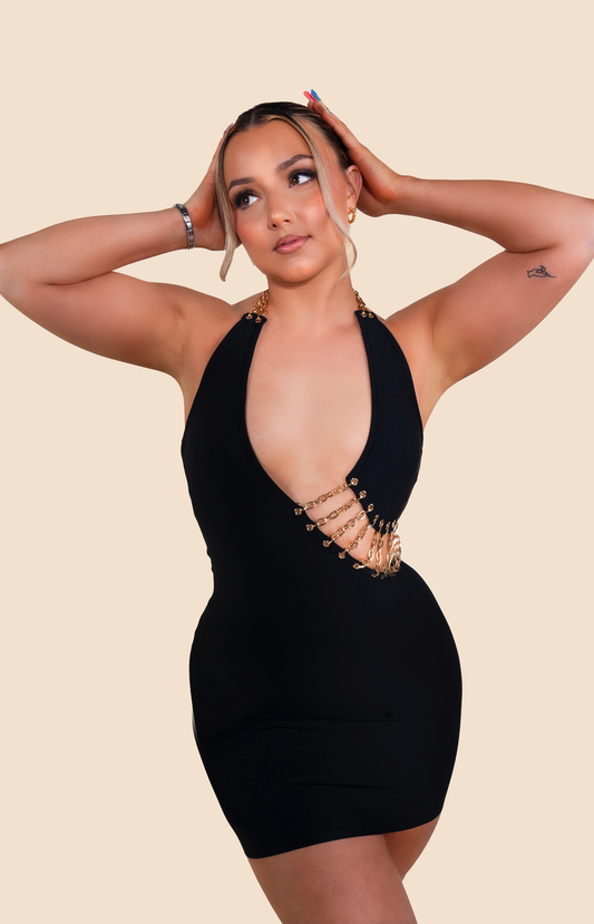 Black bandage mini dress with front cut out and embellished chain